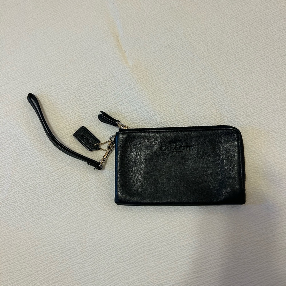 Black coach wristlet wallet 

Good condition